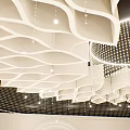 Modern Banquet Hall Interior Design With Wavy White Suspended Ceiling And Crystal Pendant Lights