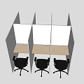 Multiple Office Desks In Cubicles With Light Wood Surface And Black Chairs