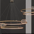 Modern Circular Illuminated Chandelier With Golden Rings And Cloud Shaped Decorations In Interior