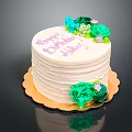 Birthday Cake with White Frosting Pink Happy Birthday Text Green Blue Flowers on Golden Tray