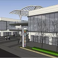 Modern Commercial Street Featuring Glass Facade Canopy Trees and Pedestrian Walkway