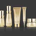 Elegant Gold Cosmetic Skincare Collection With Various Bottles Tubes And Jars