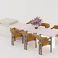 Modern Dining Table Set With Marble Top Orange Chairs And Decorative Flower Vase