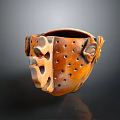 Handcrafted Brown Ceramic Decorative Container With Hollow Design And Floral Ornament