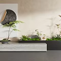 Indoor Landscape Design With Green Plants Stones Circular Decoration Gray Countertop And Light Colored Wall