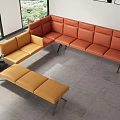 Orange Leather Double Sofa In Modern Interior With Yellow Accent Chair Ottoman And Wall Art