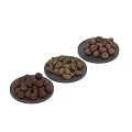 Decorative Ornament Set With Three Black Plates Holding Various Nuts 3d model