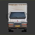 Mitsubishi Box Truck With Rusted Exterior And White Cargo Box Design