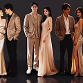 Group of People In Formal Suits And Elegant Dresses Beige Gold Tones Dark Background