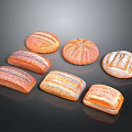 Assorted Freshly Baked Bread With Different Shapes And Striped Patterns