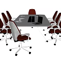 Modern White Conference Table With White And Orange Chairs And Laptop In Office