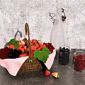 Fresh Fruit Basket Filled With Strawberries Raspberries Blueberries On Gray Countertop With Glass Jars
