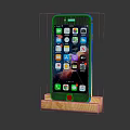 Red Mobile Phone Placed on Wooden Stand with Screen Showing Multiple App Icons