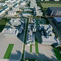 Aerial View of Modern Industrial Factory Complex with Multiple Buildings and Green Spaces