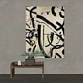 Black and White Abstract Painting on Gray Wall with Wooden Tray Vase and Green Plants