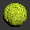Green Textured Tennis Ball With Shiny Reflection On Dark Surface