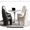 Modern Table and Chair Set with White Round Table Black White Chairs Laptop and Cup