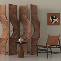 Wooden Room Divider with Geometric Fan Shaped Panels Brown Leather Chair and Abstract Wall Art