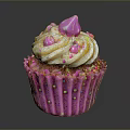 Sweet Pink Cupcake With Swirl Frosting And Colorful Sprinkles On Decorative Wrapper
