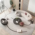 Curved Beige Sofa and Black Coffee Table Set with Armchair Floor Lamp and Plant on Rug