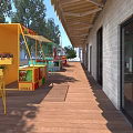 Bright Colorful Outdoor Street Vending Kiosks Along Sunny Urban Public Wooden Pedestrian Walkway