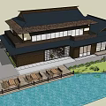 Traditional Waterfront Commercial Complex With Wooden Structure Black Roof And Outdoor Terrace Seating