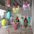 Art Installation With Transparent Cubes Containing Colorful Flowers And Cotton Elements Hanging And Placed Indoors