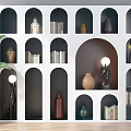 Modern Bookcase Interior Design With Books Vases Decorative Lamps And Potted Plant