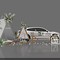 Outdoor Stylish Setup With White Car Triangular Tent Floral Decor And Green Plants