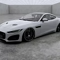 White Jaguar Sports Car With Modern Sleek Exterior In Gray Indoor Space