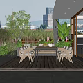 Urban Roof Garden With Wooden Deck Outdoor Dining Table And Lush Greenery