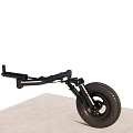 Black Tire With Rim Connected To Spring Support Mechanism On Gray Surface