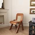 Wooden Dining Chair With Woven Backrest Near Fireplace And Gold Framed Pictures On Wooden Floor