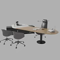 Modern Curved Office Desk with Desk Lamp Laptop Documents and Ergonomic Gray Office Chairs