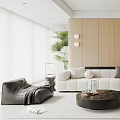 Modern Living Room With Sofa Round Coffee Table Wooden Cabinets And Plants
