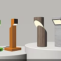 Colorful Modern Table Lamps With Green Orange Wood And Concrete Bases On Display Stands