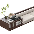 Modern Living Room Setup With Wooden Coffee Table Books Tea Set And Bamboo Plant