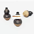 Three Gourd Shaped Ceramic Vases With Brown Black Hues And Red Accents
