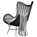 Modern Rattan Leisure Chair With Beige Black Design Soft Pillows And Stylish Blankets
