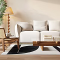 Spacious Beige Sectional Sofa With White Pillows Coffee Table Floor Lamp And Green Plant