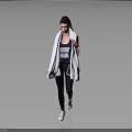 Woman in Black Workout Leggings and Top with White Towel Over Shoulders