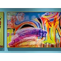 Abstract Paintings Collection on Blue Wall with Various Colors and Diverse Styles