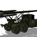 Green Military Rocket Launcher Vehicle Featuring Multiple Rocket Tubes On Truck