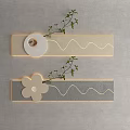 Modern Wall Decor with Wavy Lines Circular Flower Shaped Accents and Green Foliage