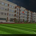 Modern Multi storey School Building With Green Lawn Football Field And Red Flag