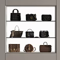 Fashionable Various Styles Bags In Black And Brown Displayed On Three Shelves