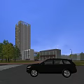 Modern Commercial Complex Tall Building Featuring Glass Facade Evening Lighting and Surrounding Trees