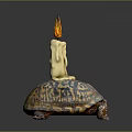 Decorative Candle With Flame On Turtle Shaped Base And Colorful Patterns