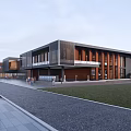 Modern Waterfront Building With Glass Facade Red Brick Accents Tiered Plaza People Relaxing Wooden Walkway
