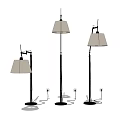 Modern Floor Lamps With Black Metal Stands And Neutral Fabric Shades For Home Decor